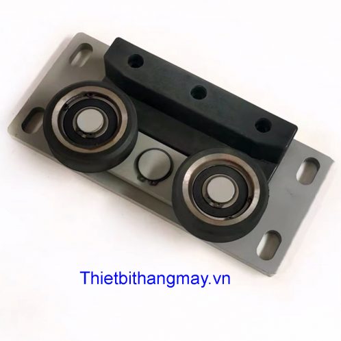 Shoe bánh xe cho thang homelift.1